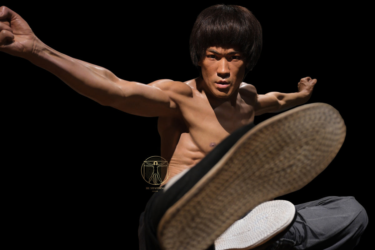 High-detail realistic muscular sculpture of Bruce Lee showcasing Jeet Kune Do physique