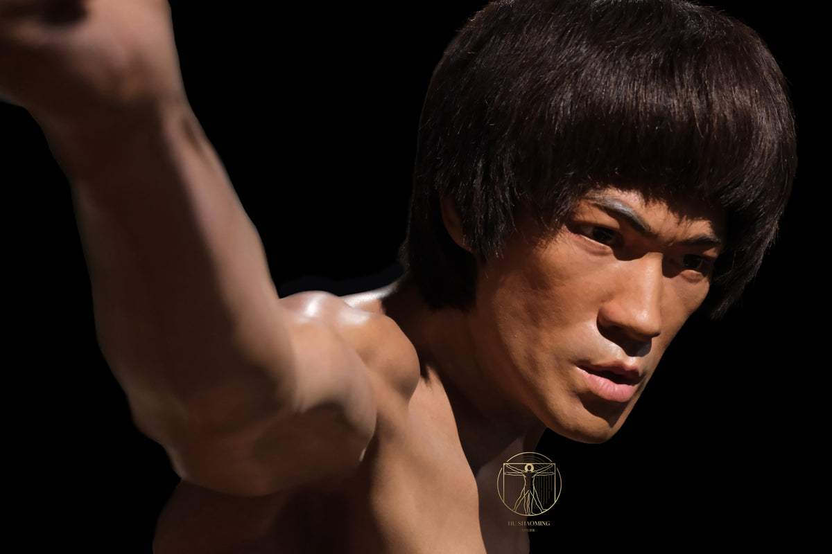 Side profile of lifelike Bruce Lee silicone statue showing focused expression and gaze