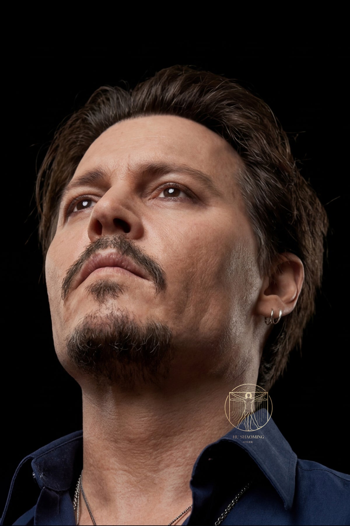 Detailed view of Johnny Depp silicone statue in an upward looking pose with realistic eyes