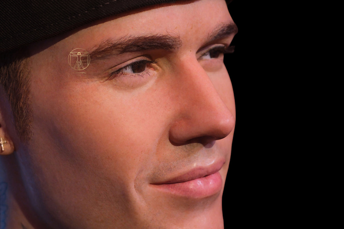 Macro view of realistic skin pores and hand-painted details on Justin Bieber figure
