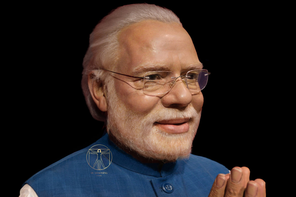 Hyperrealistic silicone sculpture of Indian PM Narendra Modi in Namaste pose by Hu Shaoming