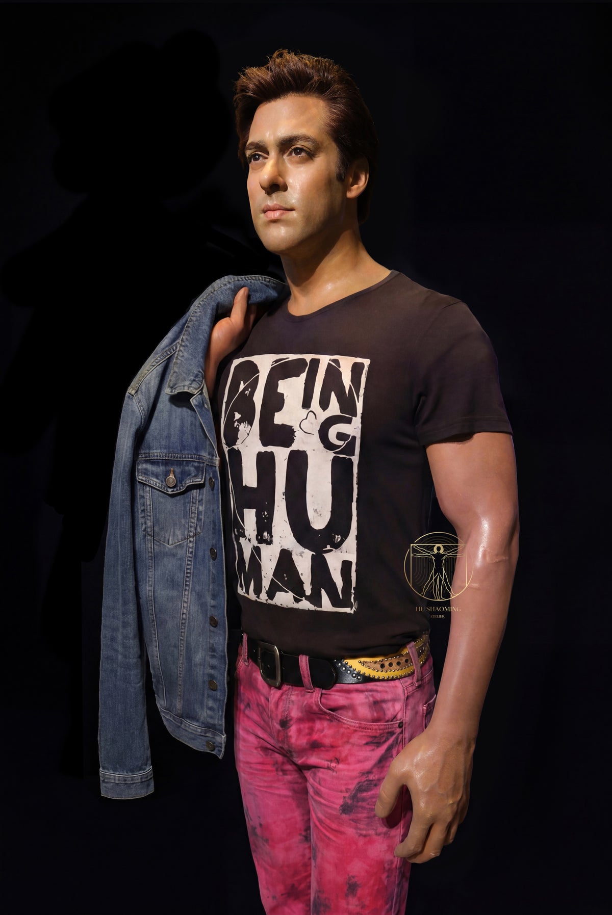 Half body silicone figure of Salman Khan in iconic denim jacket pose for museum display