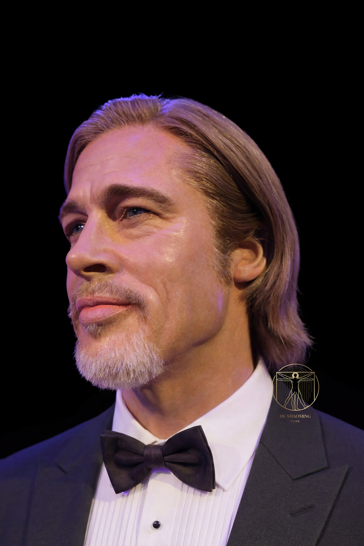 Detailed view of realistic skin texture and facial hair on Brad Pitt custom statue