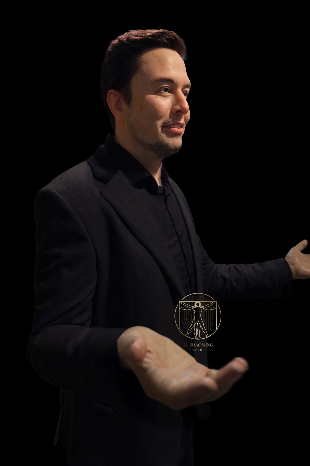 Elon Musk silicone figure in a signature gesturing pose by Hu Shaoming Atelier