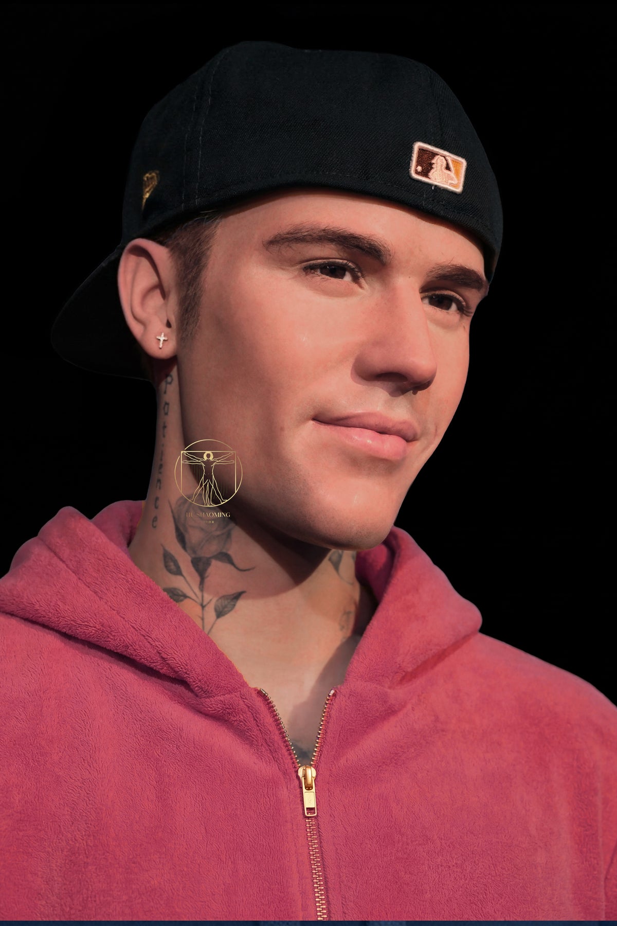 Detailed view of the rose and Patience neck tattoo on Justin Bieber custom figure