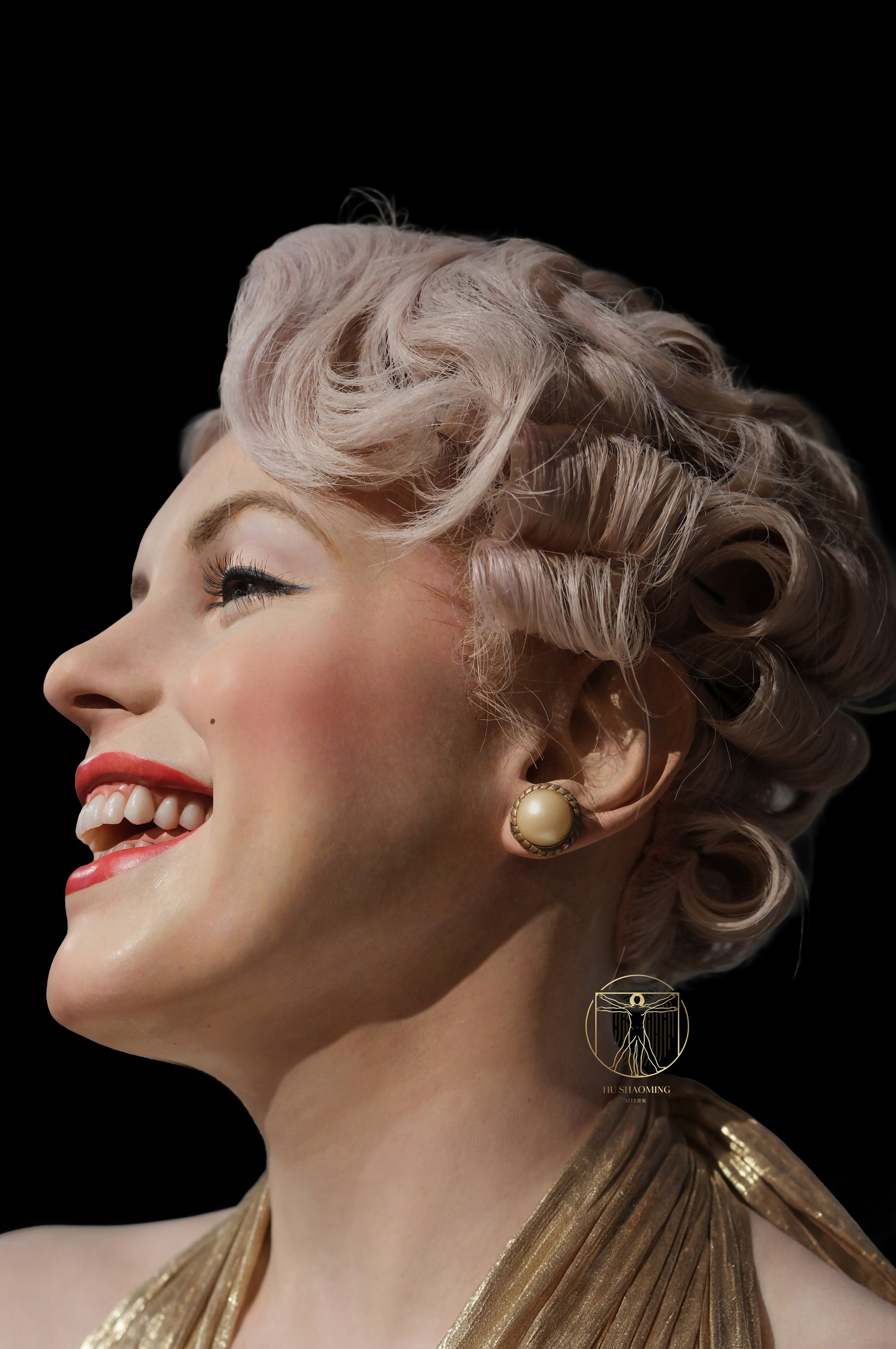 Macro view of realistic blonde curls and skin texture on Marilyn Monroe sculpture