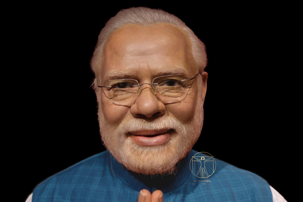 Hyperrealistic face sculpture of Narendra Modi featuring manual beard implantation