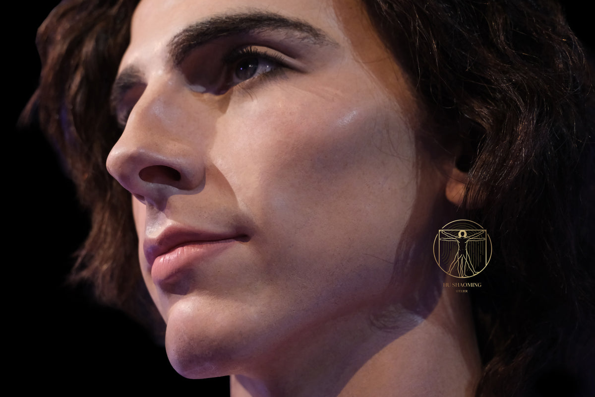 Detailed low angle view of realistic skin pores and capillaries on Timothée Chalamet statue