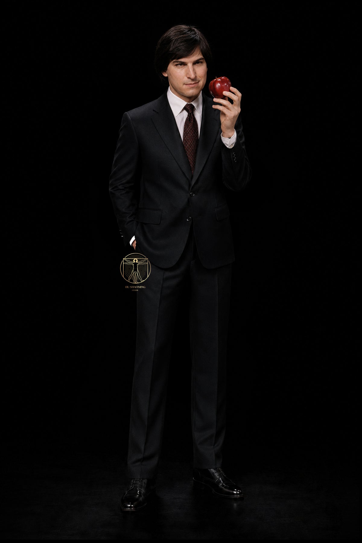 Life-size Young Steve Jobs hyperrealistic silicone sculpture holding a red apple by Hu Shaoming